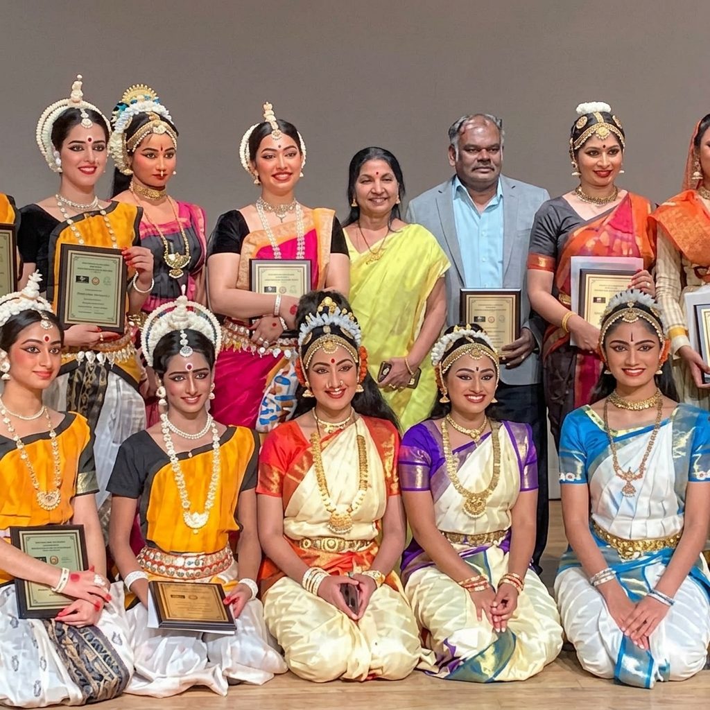 Classical dancers with founders at awards ceremony